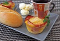 Creative breakfast Ã¢â¬â egg muffins with bacon, coffee, white bread, butter Royalty Free Stock Photo